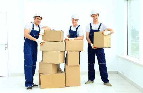 Packed office equipment and furniture prepared for a Marylebone business move