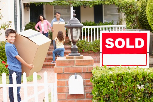 Careful wrapping and labeling of household items during packing services in Marylebone